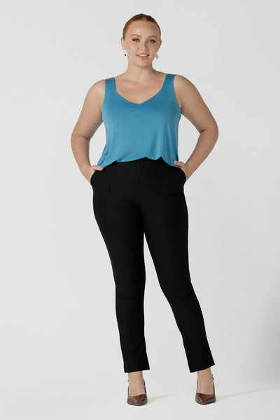 Size 12 Woman wearing the Eddy Cami in Mineral  with wide straps. Made in Australia for women size 8 - 24. Size 18 woman wears the Eddy Cami top in Mineral is a curve friendly cami top with wide shoulder straps for bra strap coverage. Made in Australia for women size 8 - 24.