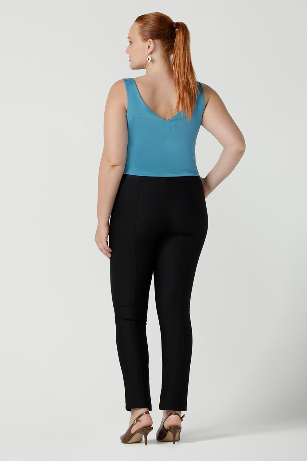 Back view of a size 12 a slim leg pant, black pants by Australian and New Zealand women's clothing brand, L&F. These comfortable work pants are worn with a Eddy cami in Mineral. Made in Australia for women size 8 - 24.