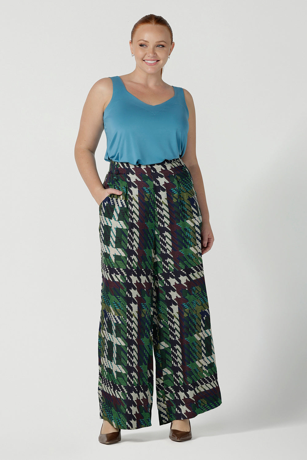 Size 12 Woman wearing the Eddy Cami in Mineral with wide straps. Styled back with the Ellery pant in Houndstooth. Made in Australia for women size 8 - 24. 