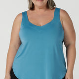 Size 18 woman wears the Eddy Cami top in Mineral is a curve friendly cami top with wide shoulder straps for bra strap coverage. Made in Australia for women size 8 - 24.