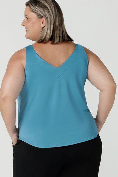 Back view of a size 18 woman wears the Eddy Cami top in Mineral is a curve friendly cami top with wide shoulder straps for bra strap coverage. Made in Australia for women size 8 - 24.