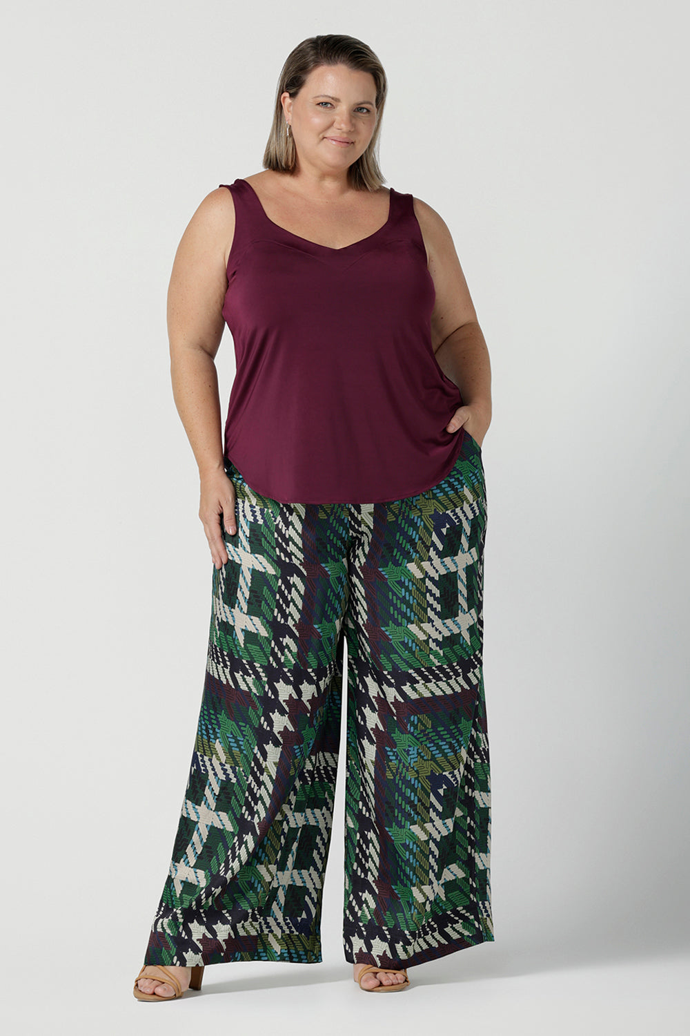 Size 18 Woman wears the Ellery Pant in Silky Italian Viscose. Size inclusive fashion. Tailored pants for work to event dressing. Made in Australia for women size 8 - 24.