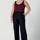 Eddy Cami top in Plum with wide straps. Made in Australia for women size 8 -24. style back with high waist Lulu pants in Navy. Soft tailored pants.