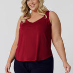 This lightweight red cami is the ideal addition to your summer wardrobe! Made from high-quality slinky jersey fabric, it offers a luxurious feel while being easy to care for. Its vibrant festive colour-way brings a cheerful touch, perfect for warmer months and all your summer celebrations. Proudly Australian made, this cami combines style and practicality, ensuring you stay cool and fashionable all season long. Dress it up or down for any occasion. Shop now in sizes 8-24.