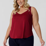 This lightweight red cami is the ideal addition to your summer wardrobe! Made from high-quality slinky jersey fabric, it offers a luxurious feel while being easy to care for. Its vibrant festive colour-way brings a cheerful touch, perfect for warmer months and all your summer celebrations. Proudly Australian made, this cami combines style and practicality, ensuring you stay cool and fashionable all season long. Dress it up or down for any occasion. Shop now in sizes 8-24.