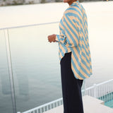 Featuring a sophisticated collared V-neckline, the Ellis Shirt is finished with a tailored centre tuck that adds subtle structure while maintaining an effortless silhouette. This thoughtful design detail creates polish without compromising comfort.