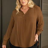 This is the Ellis Shirt in Nuthatch — an effortless piece with an oversized silhouette that’s made to move with you. Designed to be worn untucked or styled with a front or back tuck, it transitions seamlessly from relaxed to refined.