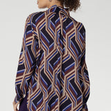 Ellis features an oversized fit that drapes beautifully and can be worn loose or styled with a front tuck for a more defined shape.