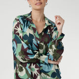 Elevate your wardrobe with the Ellis Shirt in Scandi Abstract, a statement piece crafted from a luxurious sateen-weave fabric that feels as silky as it looks. Available in sizes 8-24.