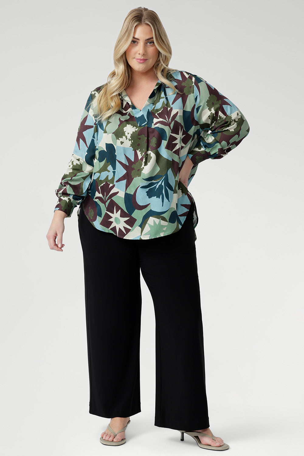 The shirt tail hemline dips slightly at the back for added shape and elegance. Proudly designed and made in Australia, the Ellis Shirt is available in inclusive sizing from 8 to 24—perfect for making a chic impression at work, events, and everywhere in between.
