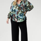 The shirt tail hemline dips slightly at the back for added shape and elegance. Proudly designed and made in Australia, the Ellis Shirt is available in inclusive sizing from 8 to 24—perfect for making a chic impression at work, events, and everywhere in between.
