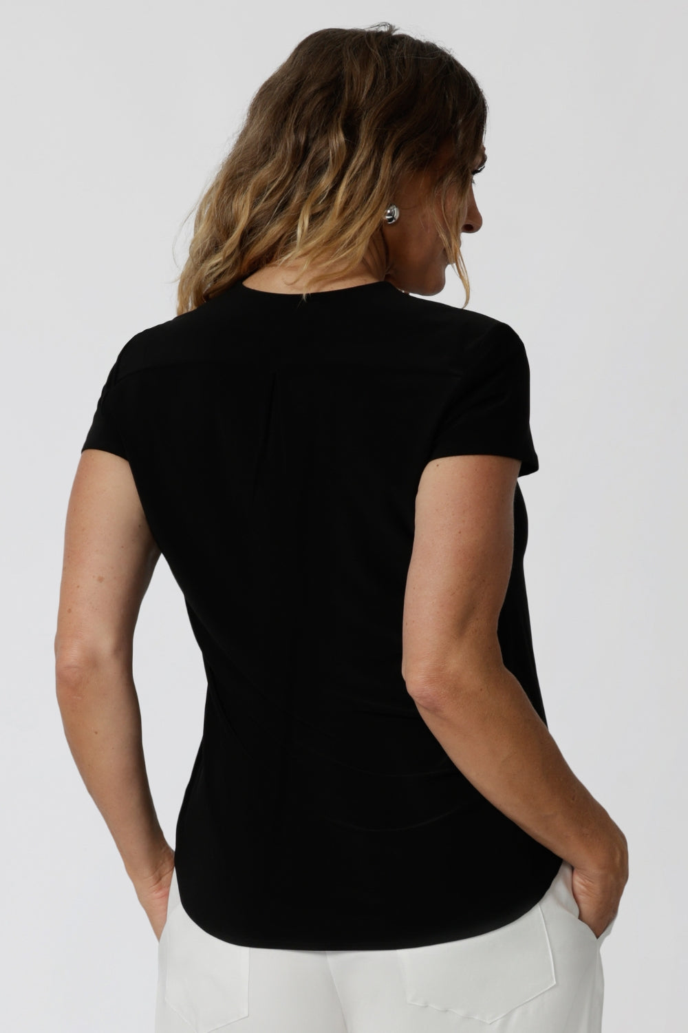 back view of a tailored jersey top with v-neckline and short sleeves - the Emily Top is a great top for relaxed corporate dressing. 