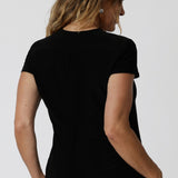 back view of a tailored jersey top with v-neckline and short sleeves - the Emily Top is a great top for relaxed corporate dressing. 