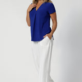 Size 12 model wears striking cobalt coloured top that showcases a balance between practicality and elegance. Australian Made using high quality dry touch jersey in sizes 8-24.