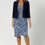 The knee-length tulip skirt gracefully hugs the body and then flares out slightly, offering a flattering and feminine shape that works beautifully for both work and after-hours events. Whether you're pairing it with the Benni Jacket for a polished office look or wearing it solo for a more casual weekend outing, the Emori Wrap Dress is as versatile as it is stylish.