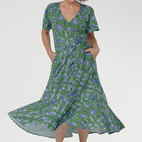 Lightweight with gentle stretch, it features a fixed wrap silhouette, detachable belt and double-layered back bodice.