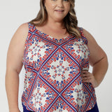 Cami features v neckline in both the front and back, as well as geometric pattern in shades of blue and red. Summer Cami provides contemporary flair to the otherwise minimalist design. The bold yet balanced print creates a sense of movement and depth, with sharp lines and subtle curves that stand out beautifully against the white background.