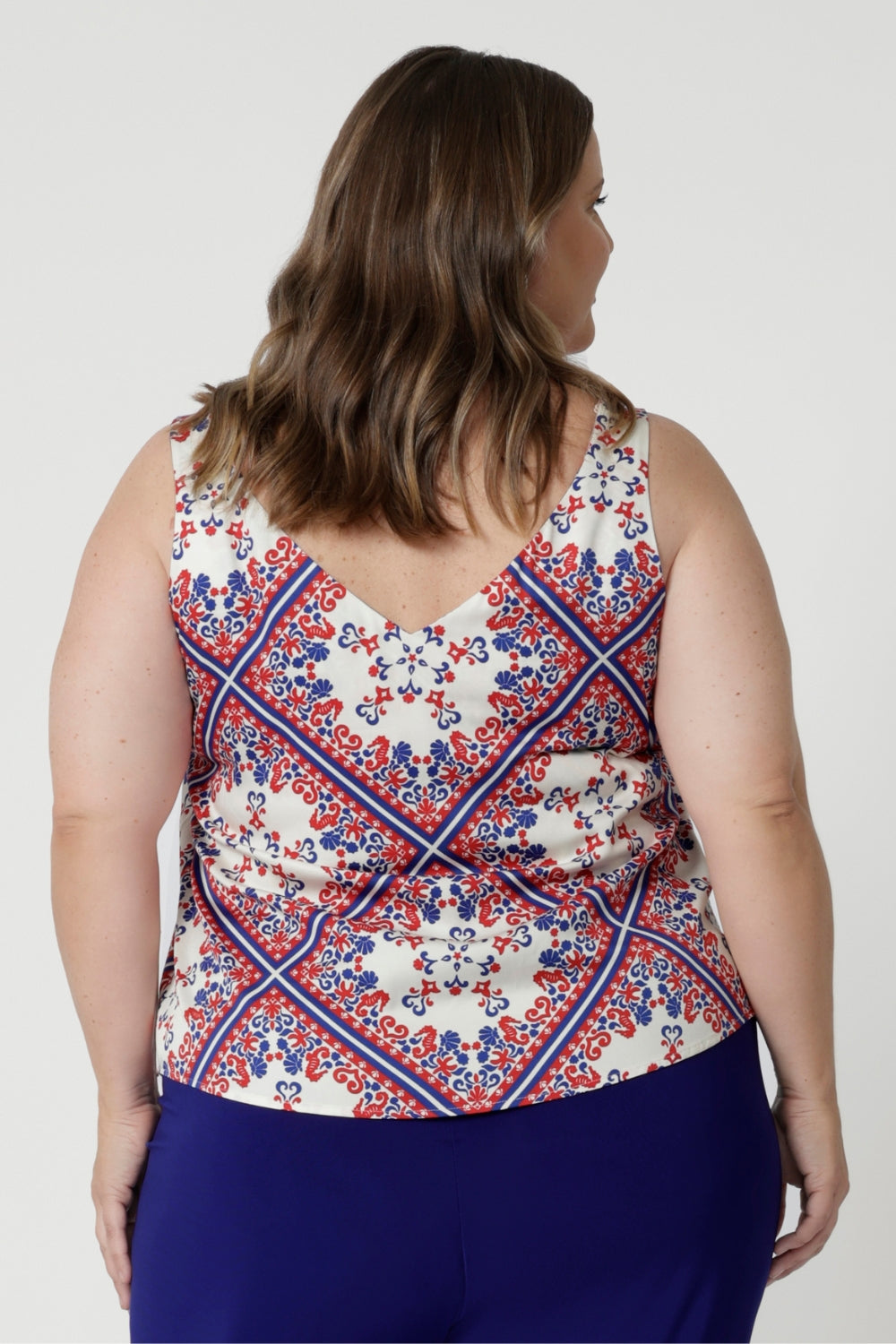 This cami is designed as part of a matching set, perfectly complementing a pair of high-waisted pants and a coordinating 3/4-sleeved top. Together, the pieces create a cohesive, fashion-forward look that feels fresh and modern yet timeless. The soft, breathable fabric and the flattering cut make the cami an ideal choice for hot summer days, whether dressed up for an event or styled casually for a relaxed outing.