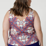 This cami is designed as part of a matching set, perfectly complementing a pair of high-waisted pants and a coordinating 3/4-sleeved top. Together, the pieces create a cohesive, fashion-forward look that feels fresh and modern yet timeless. The soft, breathable fabric and the flattering cut make the cami an ideal choice for hot summer days, whether dressed up for an event or styled casually for a relaxed outing.