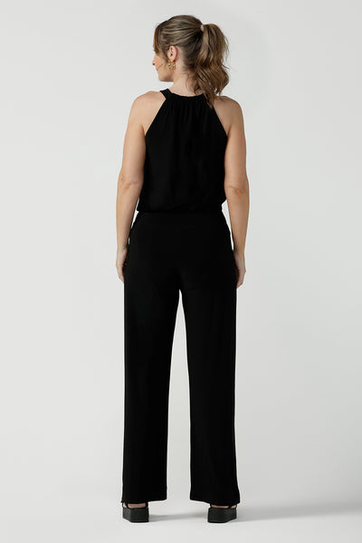 Back view of Womens size 8 jersey jumpsuit in navy. Smart casual womens jumpsuit. Halter neck jumpsuit.