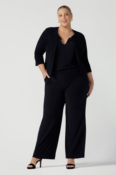 Womens jumpsuit stretch jersey halter neck style with ties. Smart casual jumpsuits for curvy women. Layered with smart workwear jacket. 