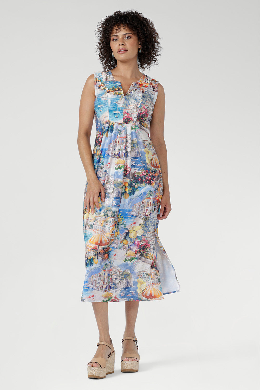 This lightweight midi dress is perfect for summer getaways, evenings, and warm-weather ease. Available in sizes 8-24. Australian made.