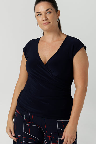 Size 12 Finley wrap top in Navy. Corporate casual workwear. Made in Australia for women size 8 - 24.