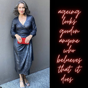 Muse for Australian fashion brand, L&F's over 50s style guide, the image shows a fifty plus woman wearing a long sleeve cocktail wrap dress in metallic print jersey. 