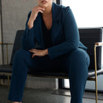 Model wears the Garcia Jacket in Petrol ponte fabric by Australian and New Zealand women's clothing brand, L&F. Featuring collar and notch lapels and long sleeves, this open-fronted jacket is good for corporate wear and casual wear.