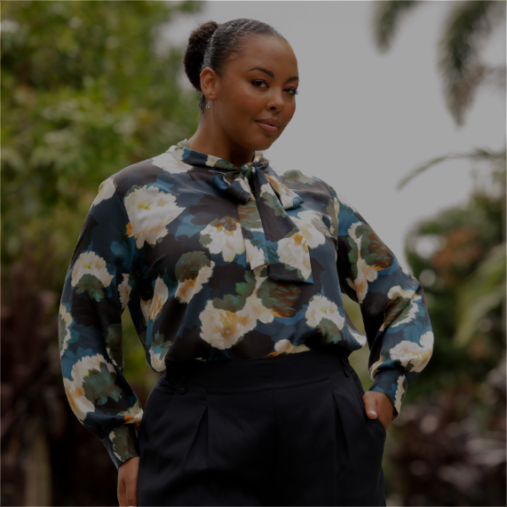 woman wearing a pussy bow tie neck shirt with blouson sleeves in sustainable fabrics to showcase Australian and New Zealand women's clothing label, L&F's autumn fashion look book.