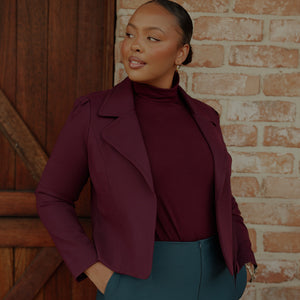 winter style by Australian and New Zealand women's clothing label, L&F - a woman wears a tailored jacket and bamboo jersey polo neck top.