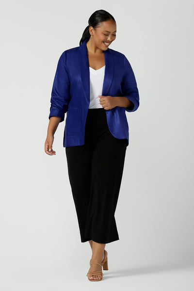 Houston Blazer in Cobalt Linen size 16. Softly tailored in Linen with front pockets and a functioning button front. Made in Australia for women size 8 - 24. Styled back with white Eddy cami top.