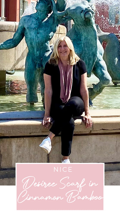 Loyal customer of Australian and New Zealand women's clothing label, L&F, Susan wears her bamboo jersey, pink scarf and black bamboo jersey top with slim-leg black pants on holiday in Nice, as part of her guide on what clothes to pack for the ultimate capsule travel wardrobe.