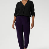 A size 10 Indi pant in Amethyst in a jersey workwear pant with pleat front and cuffed leg opening. Made in Australia for women size 8-24.  Styled back with the Terry Shirt in Graphite. Now available in 2 lengths.