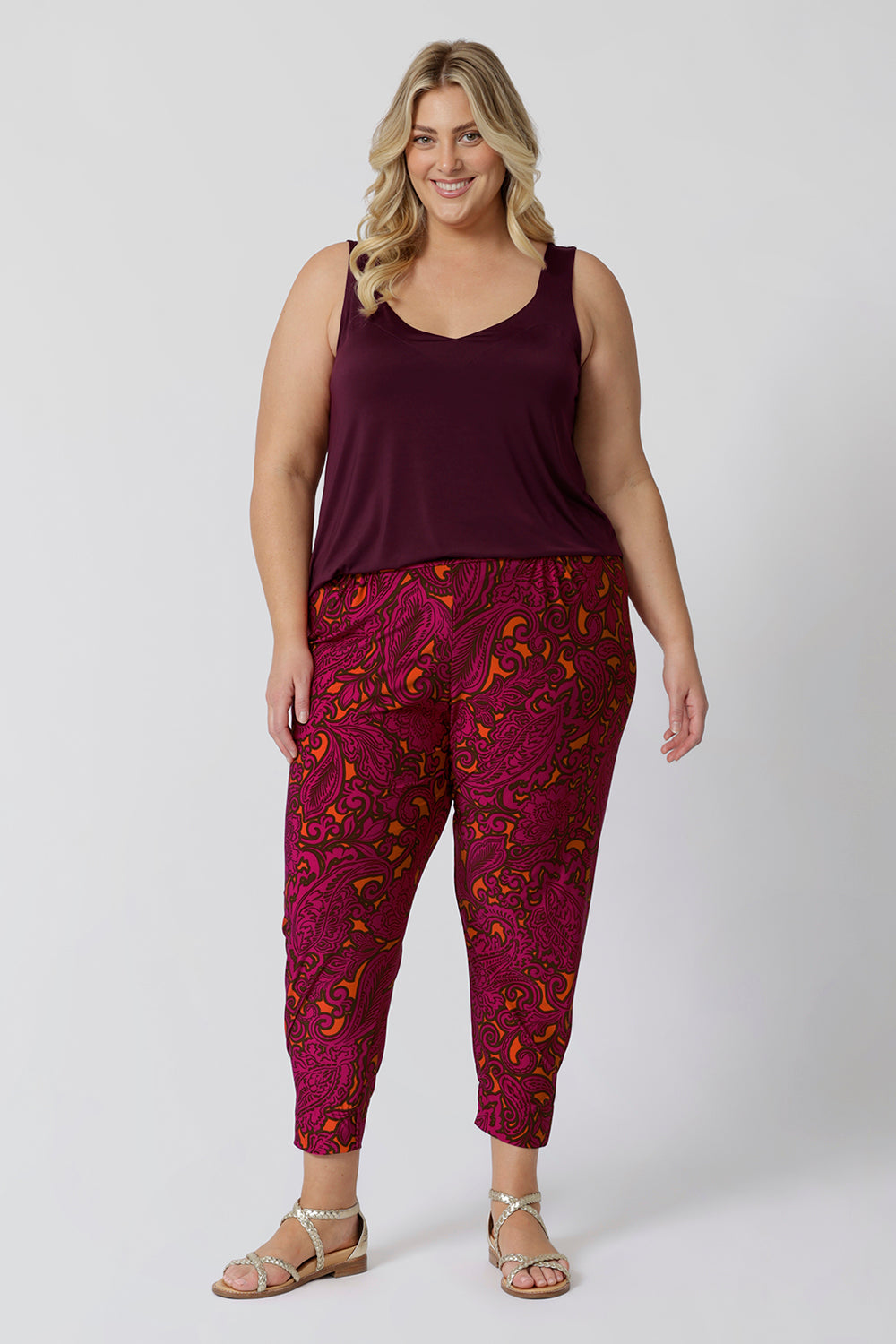 These travel pants are the ultimate in comfort and style for your next adventure. Featuring a vibrant paisley print, they offer a fun and chic design that stands out while still being versatile enough for travel. Made with a soft, cool-touch fabric, they keep you comfortable throughout long flights or sunny sightseeing days, providing breathability and ease. The pull-on style ensures a relaxed fit, making them effortless to wear—no zippers or buttons to fuss with. Plus, they come stocked in two heights.