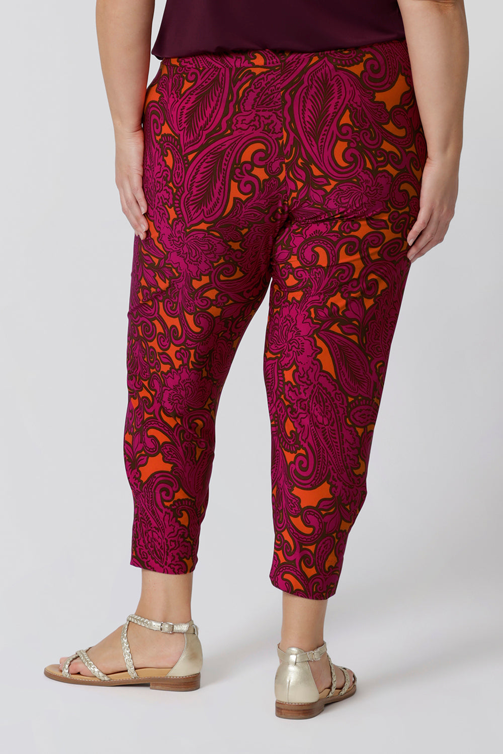 Close up of vibrant paisley printed pants. Pull-on style ensures a relaxed fit, making them easy care, easy wear pants. Leina & Fleur come stocked in two heights and in sizes 8-24.