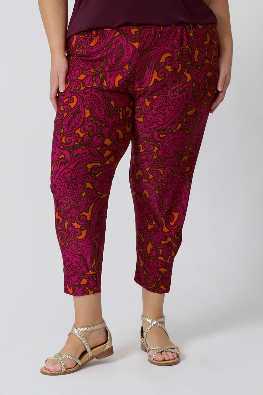 These travel pants are the ultimate in comfort and style for your next adventure. Featuring a vibrant paisley print. This pull-on style ensures a relaxed fit, making them effortless to wear—no zippers or buttons to fuss with. Easy care pants come stocked in two heights in sizes 8-24.