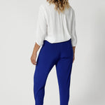 back view of wrinkle-resistant travel pants with properties that retain their crisp, smooth look throughout the day, even after long hours at the office or travel. There's no need for ironing, making them an easy, fuss-free choice for both work and leisure. Crafted with care from dry touch jersey fabric. Australian made in sizes 8-24.