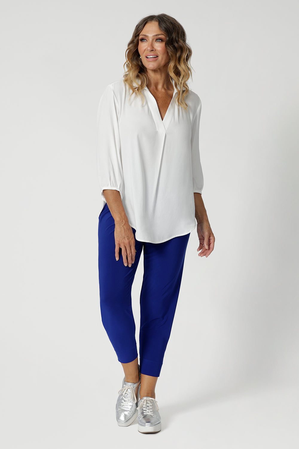 In a brightly coloured cobalt shade, these pants bring a bold, vibrant pop of colour to your wardrobe, making them an eye-catching yet professional choice. The rich, deep blue is both contemporary and chic, versatile enough to be paired with neutrals or more daring tones for a stylish, well-rounded outfit. available in sizes 8-24