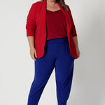 These pants are perfect for both business casual and smart casual environments, whether worn with a blazer and blouse for a professional look or paired with a simple top for a more relaxed outfit. Their versatility, vibrant colour, and high-quality, easy-care fabric make them a standout piece in any wardrobe.