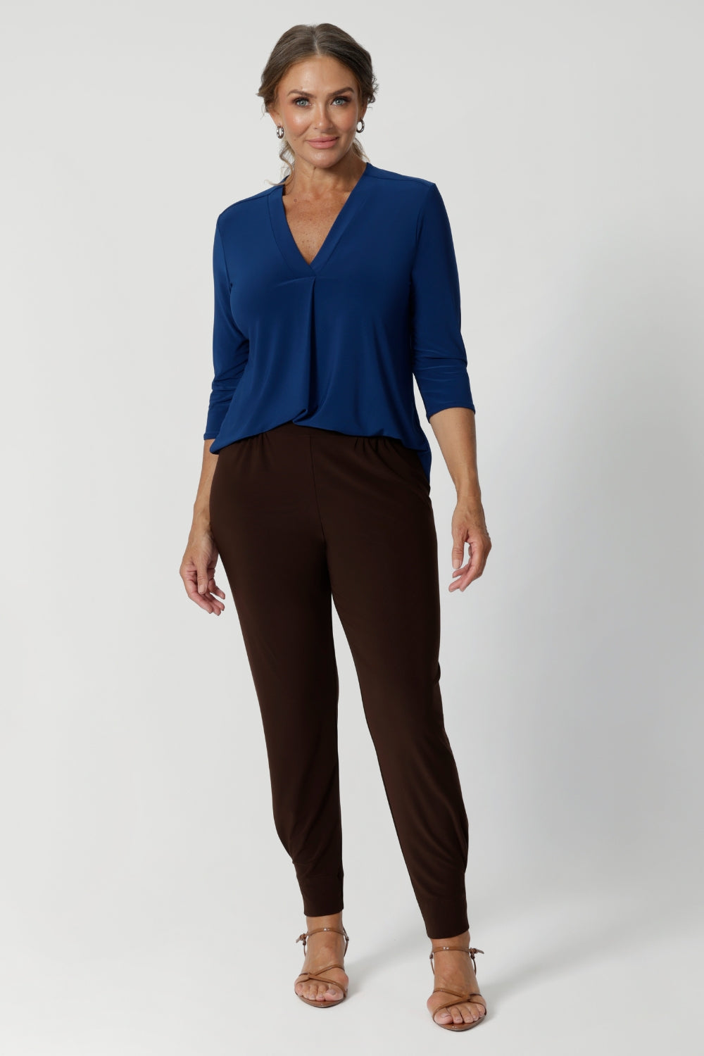 Black workwear pants have a pull on style and a wide straight leg. Crafted with dry touch jersey fabric in Australia for the woman on the go. Shop online at Australian women's fashion brand Leina & Fleur in a variety of sizes from 8-24. Monroe Pant now available in 3 heights.