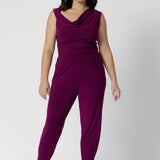 In a vibrant magenta hue, these pants effortlessly combine comfort with modern design, making them a go-to wardrobe staple you'll want in more than one pair. Petite height friendly pants are perfect for travel or casual styling. Model wears size 10.