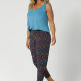 Size 12 woman wears comfortable pants with crotch ensures ease of movement, and the single inside seam legs offer a streamlined look. The mid-rise pull-on waist with a double-layer waistband provides support and comfort, while the front gathers add a touch of sophistication. Available in sizes 8-24.