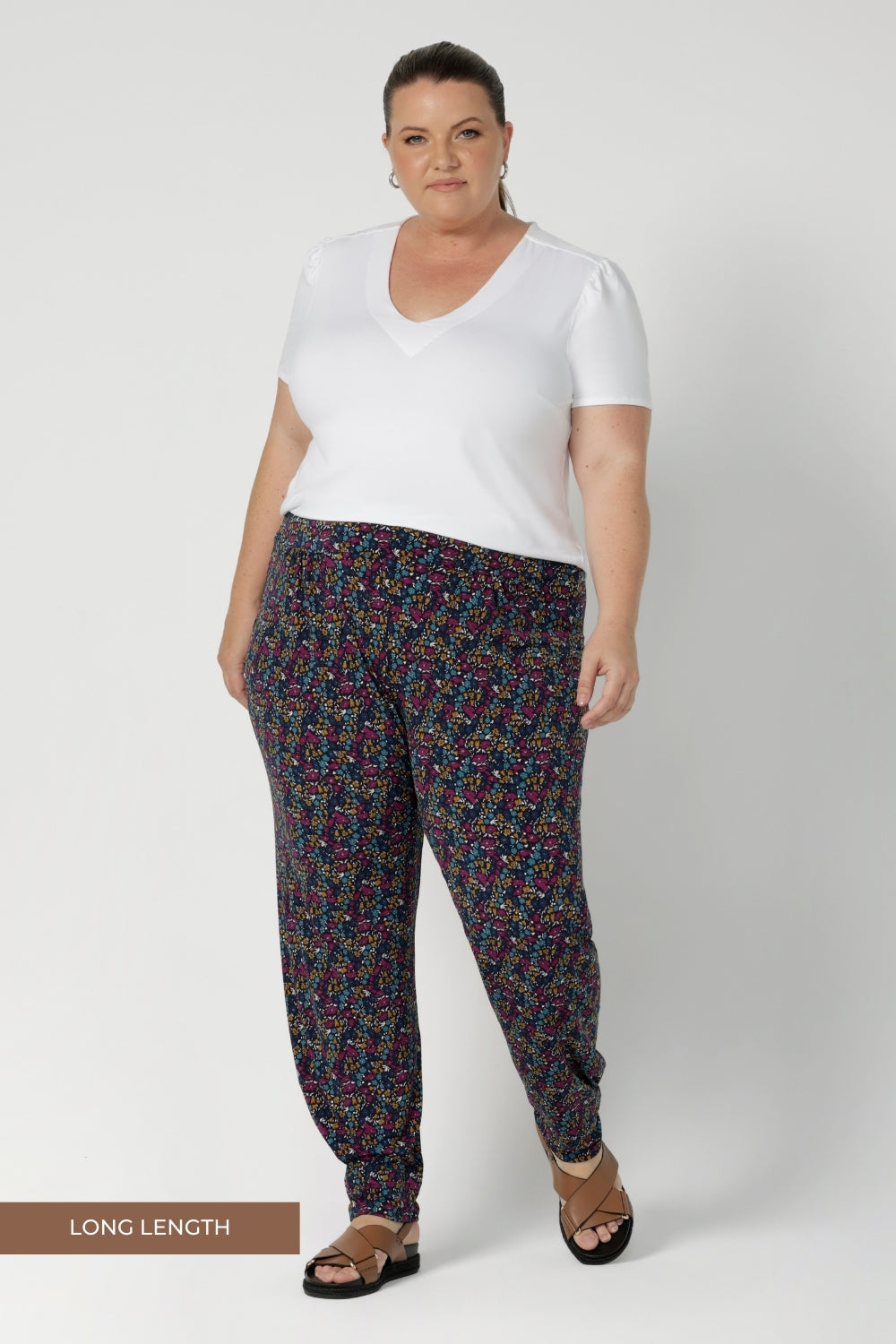 The mid-rise pull-on waist with a double-layer waistband provides support and comfort, while the front gathers add a touch of sophistication. A relaxed crotch ensures ease of movement, and the single inside seam legs offer a streamlined look.