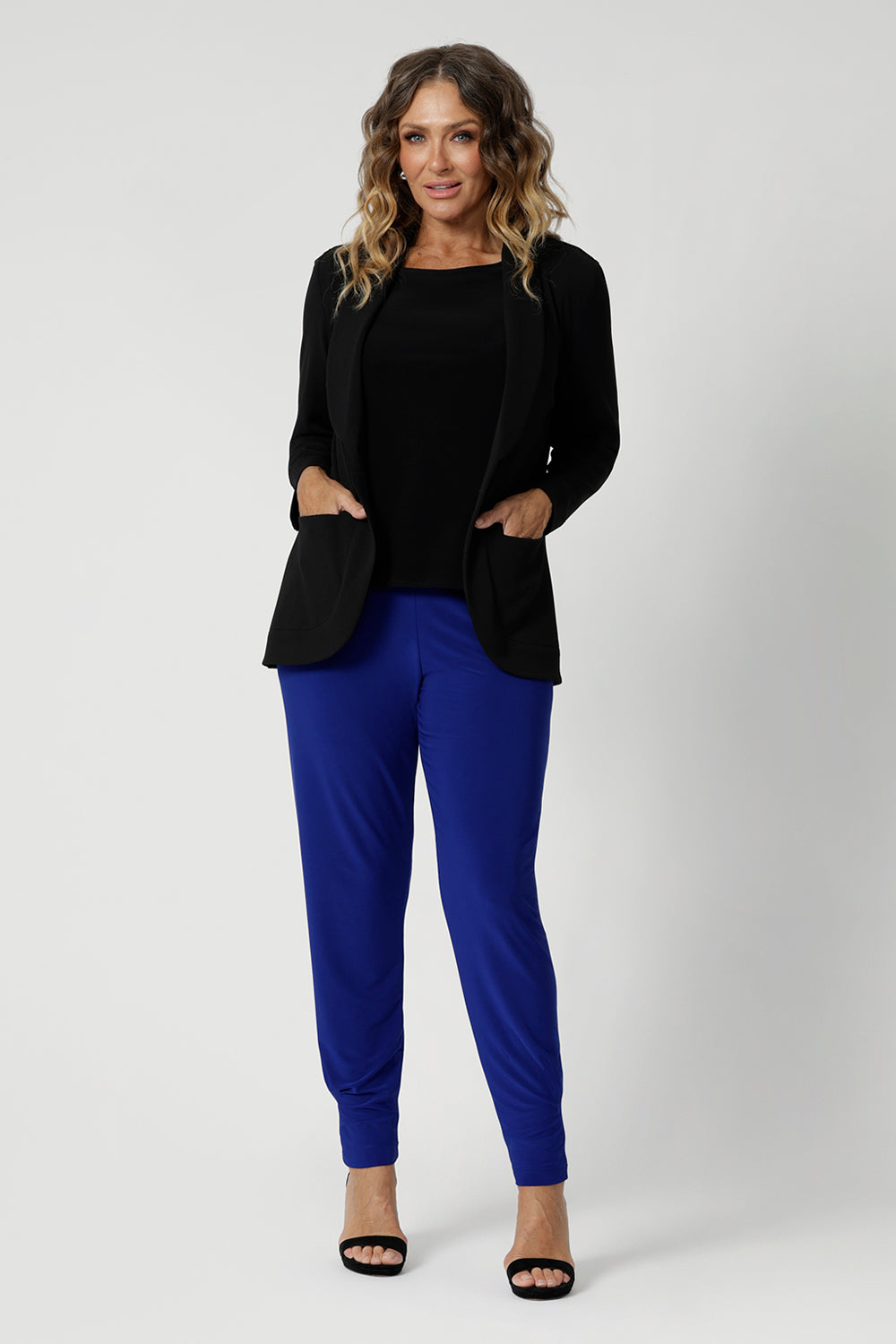 Proudly Australian made, these pants from Leina & Fleur are tailored specifically for comfort and style, with women of all sizes and shapes in mind. They offer a flattering, flexible fit that’s perfect for work wear styling. Their vibrant cobalt colour is featured in this image worn by size 12 model with black corporate blazer & top to create a classic yet bold look.