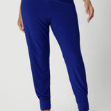 Available in a brightly coloured cobalt shade, these pants add a bold, vibrant pop to your travel wardrobe, making them an eye-catching and stylish option for any occasion. The rich cobalt blue is both sophisticated and playful, pairing beautifully with neutral or patterned tops and accessories, so you can effortlessly create a variety of looks. Sizes 8-24 available. 