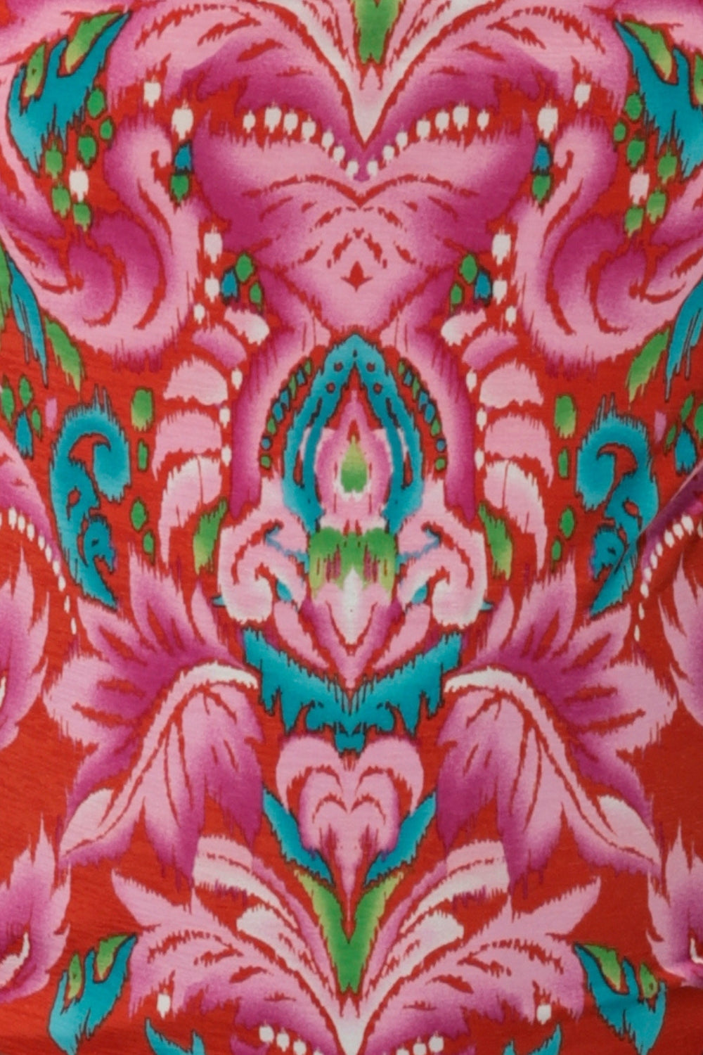 The Indian Summer print is on a lightweight Crepe Jersey that has a soft texture and stretch. The vibrant print colours are in shades of red, orange, pink, blue, green and white. This easy care fabric has a soft stretch and has been used to create summer ready collection of tops, pants & dresses.