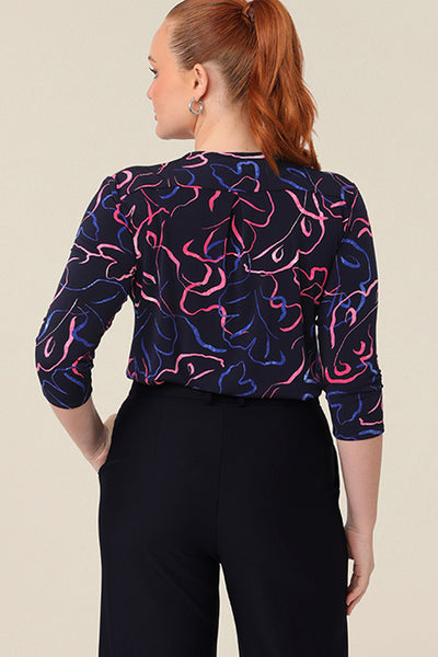 The back of a tailored, V-neck jersey top for women. The image shows the 3/4 sleeves and shape of this comfortable, casual 