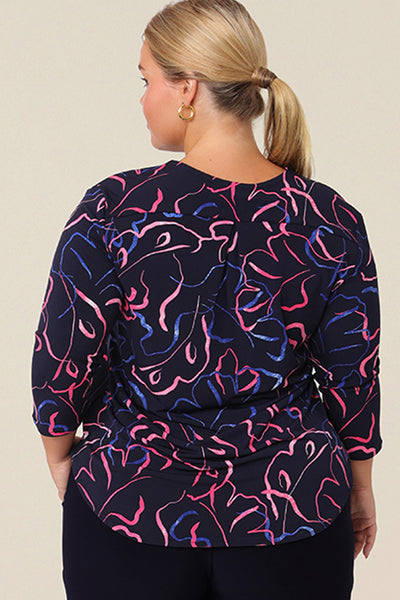 The back of a tailored, V-neck jersey top for women. The image shows the 3/4 sleeves and shape of this comfortable, casual