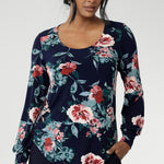 This semi-fitted silhouette features a soft scoop neckline with clean facing detail, bust darts for subtle shaping, and full-length bishop sleeves finished with a cuff that can be styled to suit your look. A classic shoulder yoke with gentle gathers at the centre back adds to the top’s fluid drape, while the shirttail hemline offers a flattering finish that looks beautiful tucked or worn loose.